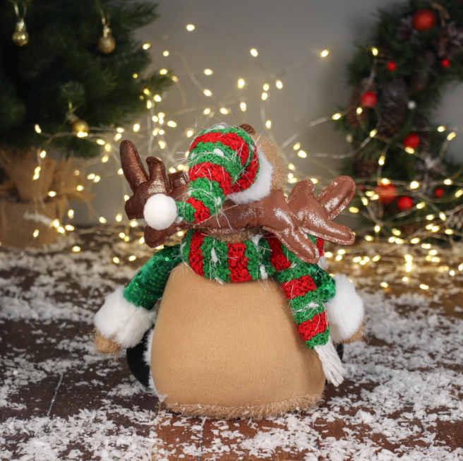 Игрушка мягкая «Олень в полосатом колпаке» сидит, 44×19 см в строительных магазинах СтройГрад